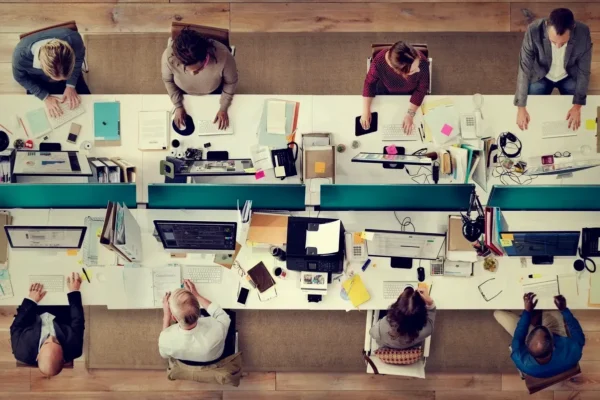 Small business team collaborating on finances—representing monthly accounting support and early-stage financial leadership from a Tampa-based strategic tax & executive advisory