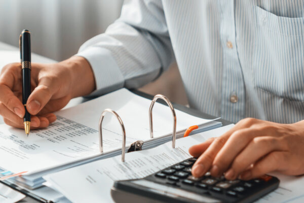 Business tax documents prepared for filing—symbolizing stress-free, compliant tax services handled by strategic tax & executive advisory experts