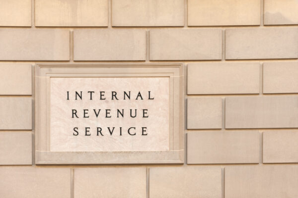 Engraved Internal Revenue Service sign on a stone wall, symbolizing The William Stanley Group’s Keeper Tax feature discussing the Cohan Rule and IRS substantiation.